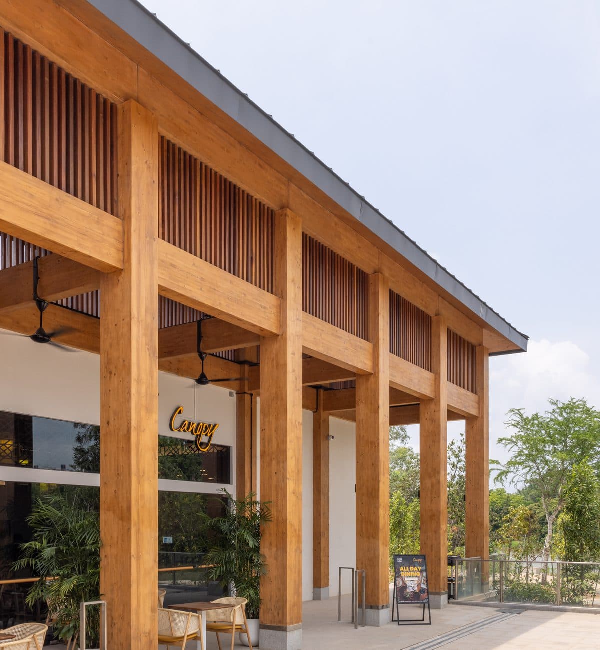 The exterior colonnade at Canopy Jurong Lake Gardens, the Canopy sign along the slatted eaves